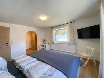 Ein Bett oder Betten in einem Zimmer der Unterkunft Ferienhaus Mayr