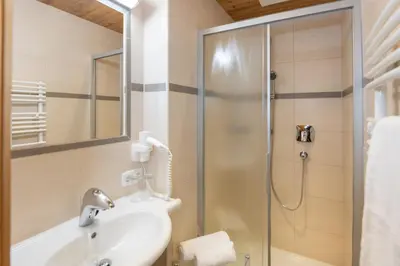 Ein Badezimmer in der Unterkunft Apparthotel Kirchgasser