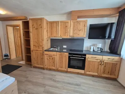Küche/Küchenzeile in der Unterkunft Apparthotel Kirchgasser