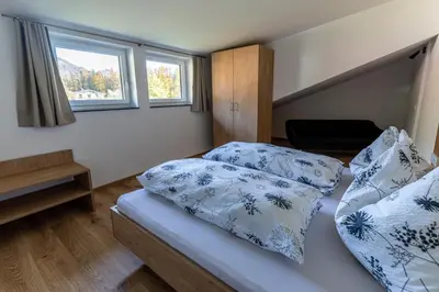 Ein Bett oder Betten in einem Zimmer der Unterkunft Ferienwohnung Eisl 2