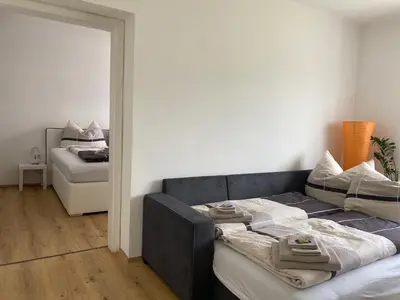 Ein Bett oder Betten in einem Zimmer der Unterkunft Ferienwohnung Beatrix