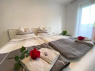 Ein Bett oder Betten in einem Zimmer der Unterkunft Ferienwohnung Beatrix