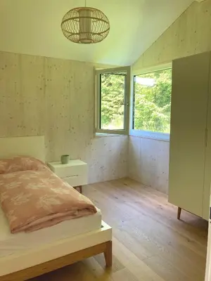 Ein Bett oder Betten in einem Zimmer der Unterkunft Lagom Haus