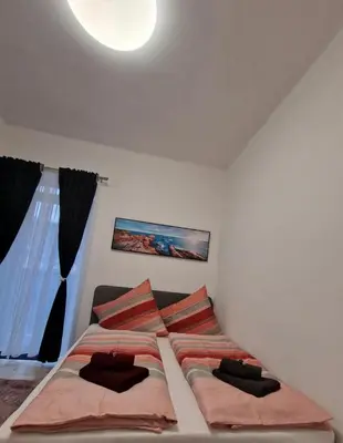 Ein Bett oder Betten in einem Zimmer der Unterkunft Appartement 223